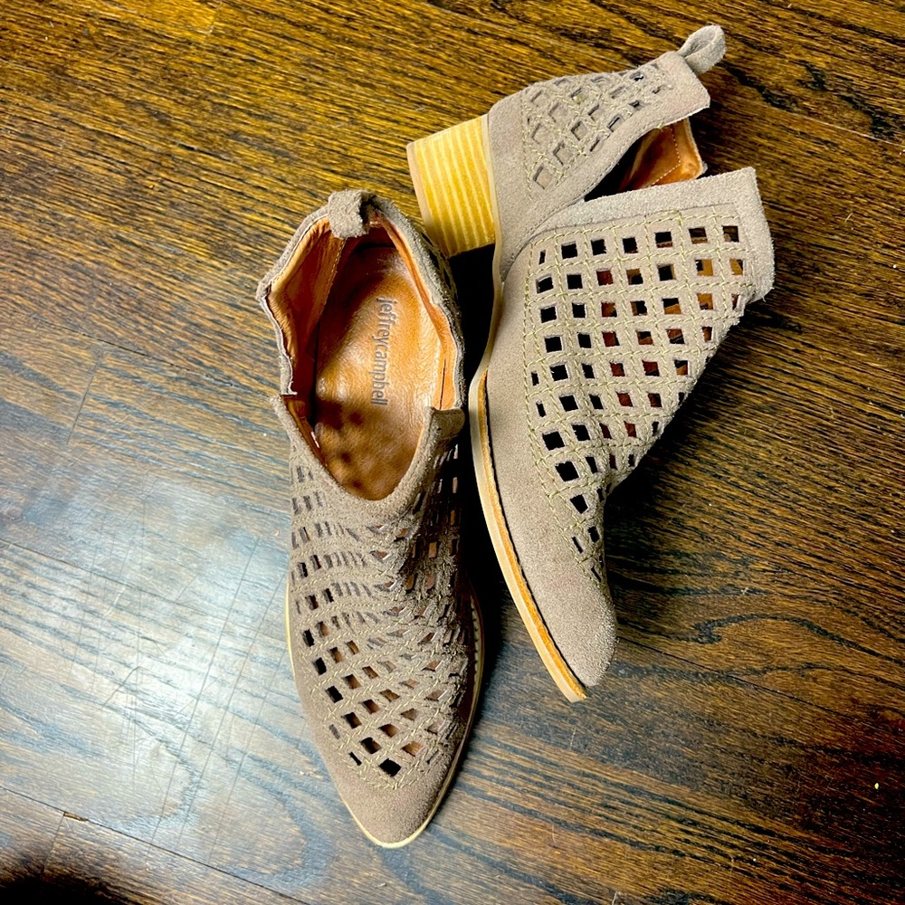 Jeffery Campbell cages leather booties with wire for perfect fit. Size 10